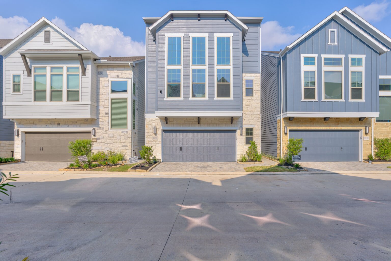 Elegant exterior of a spacious home in Houston, captured by Chivalans Photography, highlighting the architectural details and curb appeal.